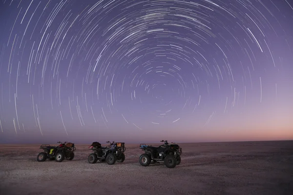 Star trail over quad bikes  — Fotografia de Stock